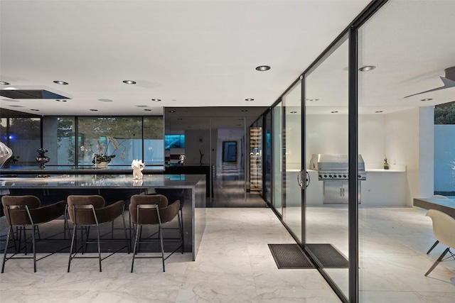 1501 Ridgecrest Dr, Austin, TX 78746 - bar featuring expansive windows and recessed lighting