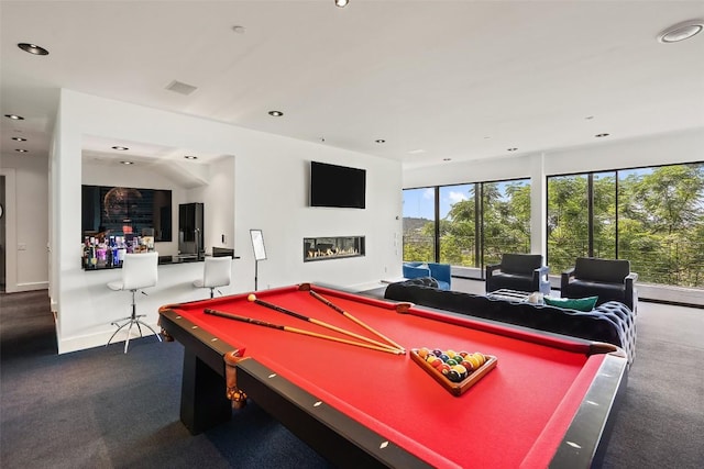 1501 Ridgecrest Dr, Austin, TX 78746 - playroom with billiards, carpet floors, recessed lighting, and a glass covered fireplace
