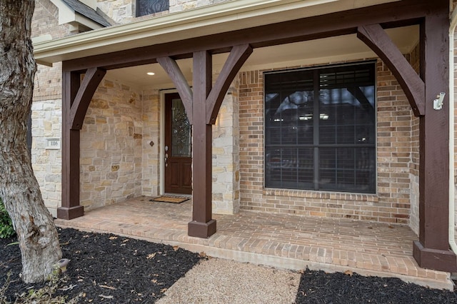 1116 Castle Path, Round Rock, TX 78681 - doorway to property featuring stone siding and brick siding