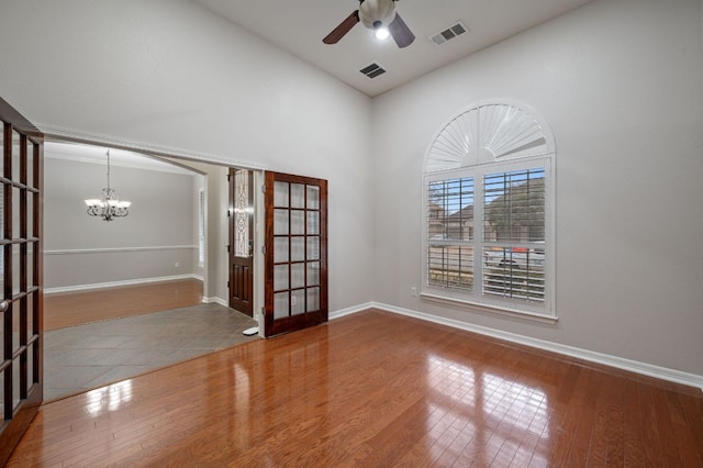 1116 Castle Path, Round Rock, TX 78681 - unfurnished room featuring a chandelier, french doors, high vaulted ceiling, ceiling fan, and wood finished floors