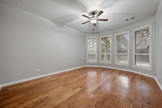 1116 Castle Path, Round Rock, TX 78681 - empty room with ceiling fan and wood finished floors
