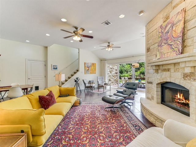 167 Manawianui Dr, Bastrop, TX 78602 - living area featuring stairway, a fireplace, a ceiling fan, recessed lighting, and lofted ceiling
