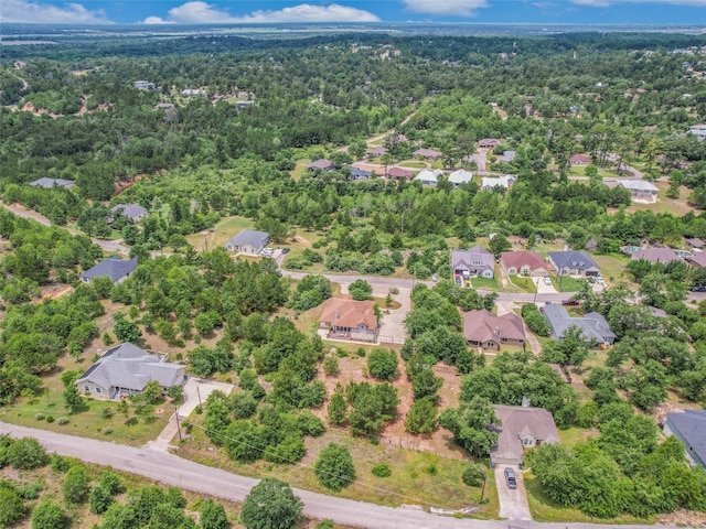 167 Manawianui Dr, Bastrop, TX 78602 - aerial view of residential area with a heavily wooded area