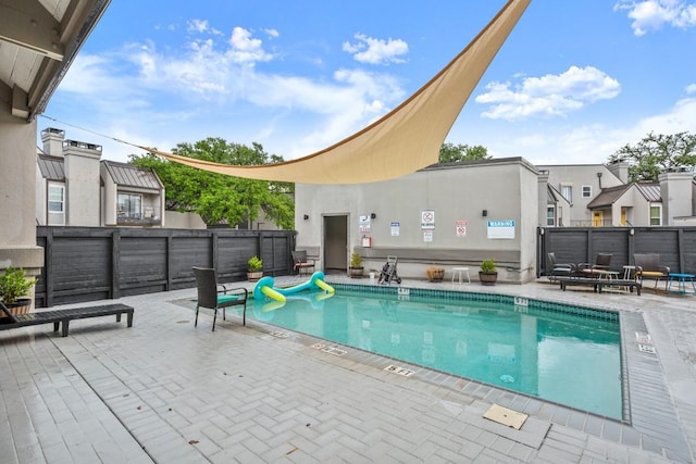 935 La Posada Dr Unit 148, Austin, TX 78752 - community pool with a patio