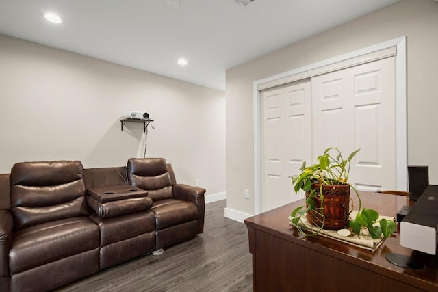 935 La Posada Dr Unit 148, Austin, TX 78752 - living room with dark wood-type flooring and recessed lighting