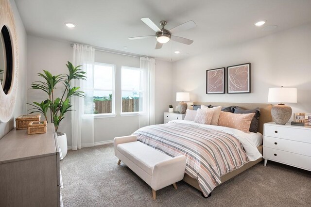 1425 Purple Martin Dr, Pflugerville, TX 78660 - bedroom featuring light colored carpet, recessed lighting, and ceiling fan