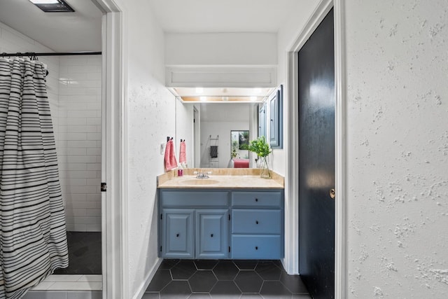 702 California Blvd Unit 702, New Braunfels, TX 78130 - bathroom with tile patterned flooring, vanity, and a shower with curtain