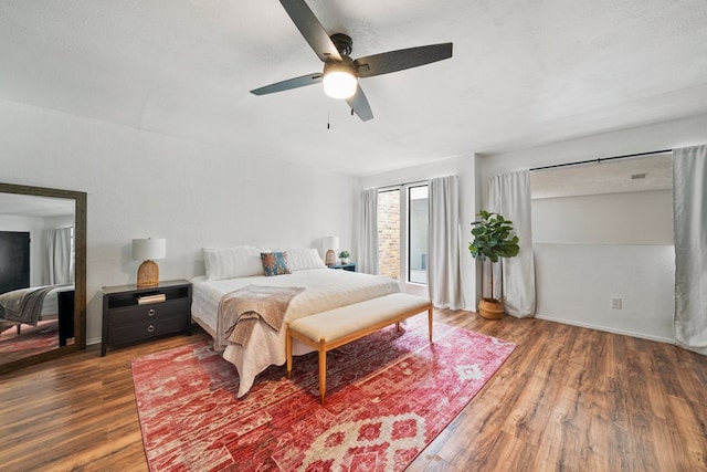 702 California Blvd Unit 702, New Braunfels, TX 78130 - bedroom with wood finished floors and ceiling fan
