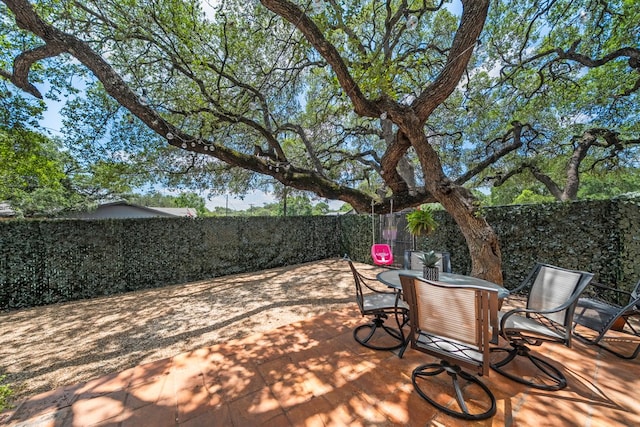 702 California Blvd Unit 702, New Braunfels, TX 78130 - fenced backyard featuring a patio area and outdoor dining space