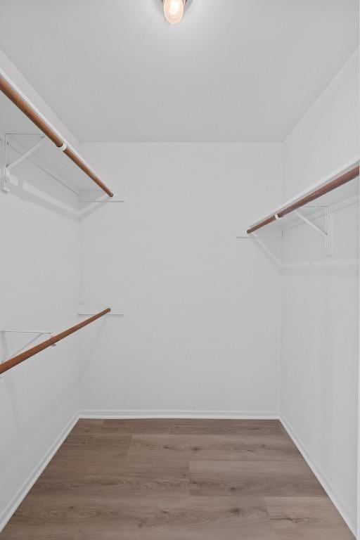 3801 Menchaca Rd Unit 6, Austin, TX 78704 - spacious closet featuring light wood-style flooring