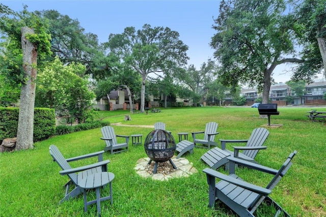 3801 Menchaca Rd Unit 6, Austin, TX 78704 - view of community with a fire pit and a lawn