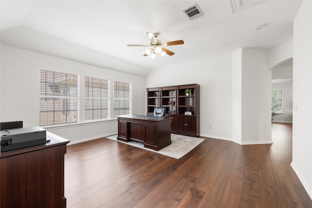 9527 Indigo Brush Dr, Austin, TX 78726 - unfurnished office with arched walkways, dark wood-style flooring, and ceiling fan