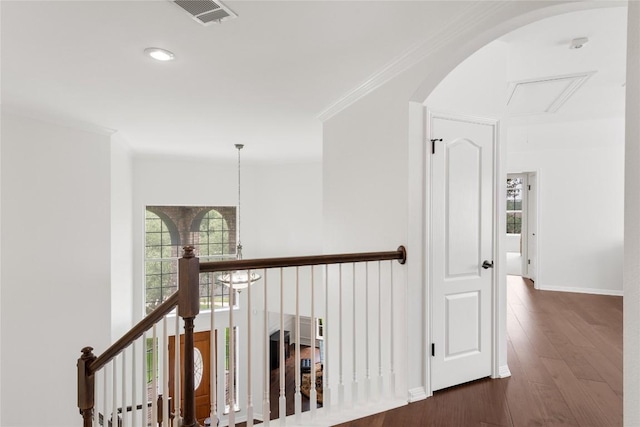 9527 Indigo Brush Dr, Austin, TX 78726 - hall featuring attic access, wood finished floors, recessed lighting, an upstairs landing, and arched walkways