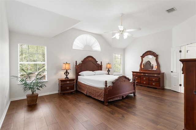 9527 Indigo Brush Dr, Austin, TX 78726 - bedroom with multiple windows, dark wood-type flooring, vaulted ceiling, and ceiling fan