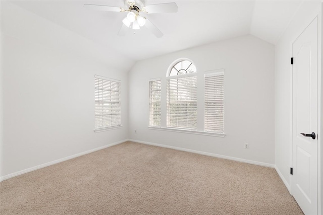 9527 Indigo Brush Dr, Austin, TX 78726 - unfurnished room with vaulted ceiling, carpet flooring, and a ceiling fan