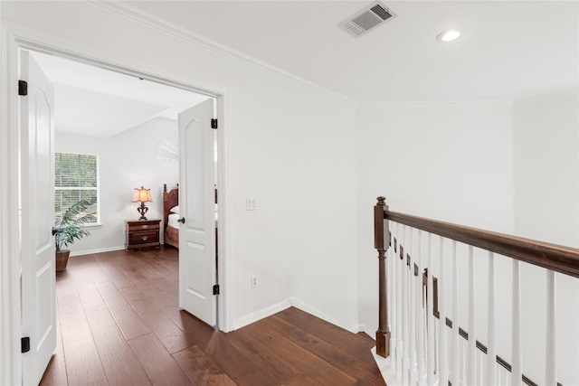 9527 Indigo Brush Dr, Austin, TX 78726 - hall featuring dark wood-style floors, an upstairs landing, recessed lighting, and ornamental molding