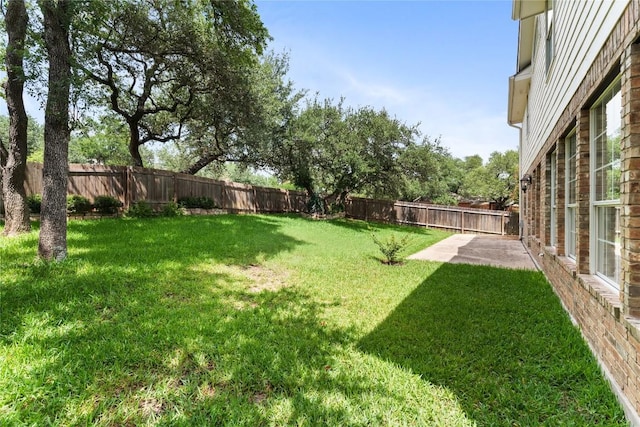 9527 Indigo Brush Dr, Austin, TX 78726 - fenced backyard with a patio area