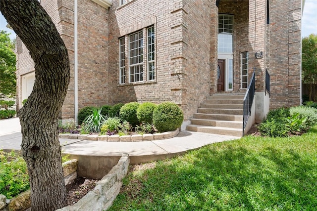 9527 Indigo Brush Dr, Austin, TX 78726 - entrance to property with brick siding