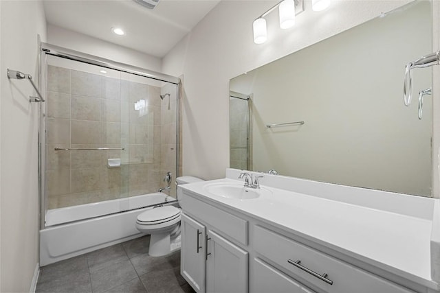 7808 Glover Dr, Austin, TX 78744 - full bath with vanity, enclosed tub / shower combo, tile patterned flooring, and recessed lighting