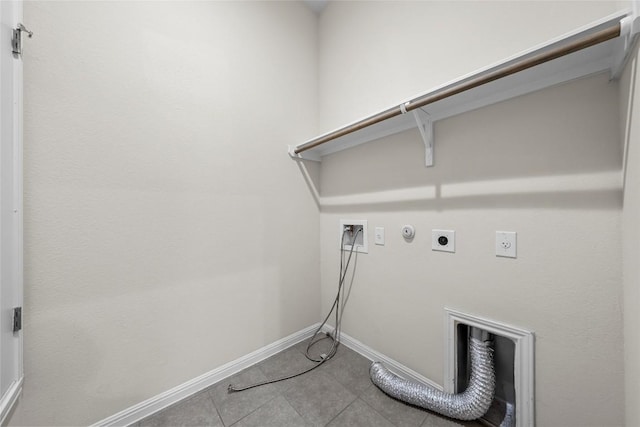 7808 Glover Dr, Austin, TX 78744 - washroom with hookup for an electric dryer, washer hookup, tile patterned flooring, and hookup for a gas dryer