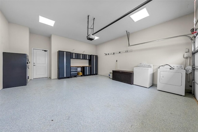 7808 Glover Dr, Austin, TX 78744 - garage with washing machine and clothes dryer and a garage door opener
