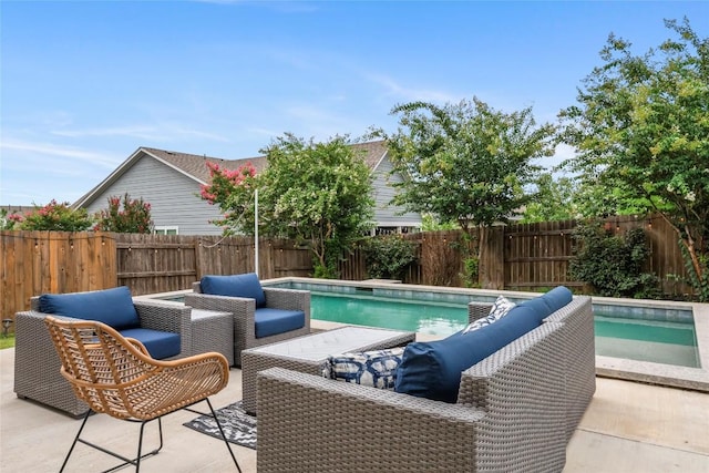 7808 Glover Dr, Austin, TX 78744 - view of pool featuring an outdoor living space, a fenced backyard, and a patio area