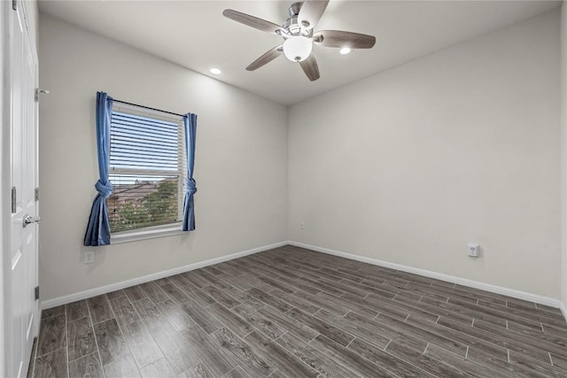 7808 Glover Dr, Austin, TX 78744 - spare room with dark wood-style flooring, a ceiling fan, and recessed lighting