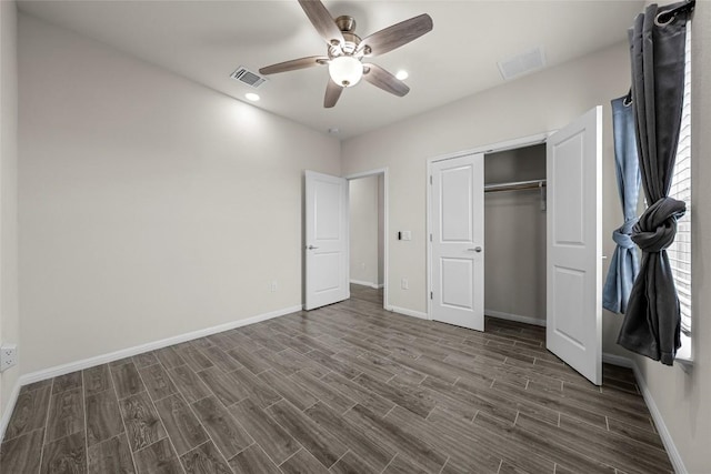 7808 Glover Dr, Austin, TX 78744 - unfurnished bedroom with dark wood-style flooring, recessed lighting, a closet, and a ceiling fan