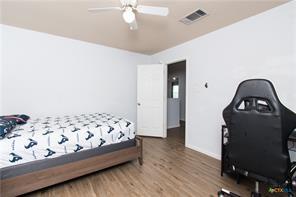 5516 Birmingham Dr, Killeen, TX 76542 - bedroom with wood finished floors and a ceiling fan