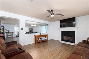 5516 Birmingham Dr, Killeen, TX 76542 - living room featuring ceiling fan, wood finished floors, and a fireplace