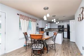 5516 Birmingham Dr, Killeen, TX 76542 - dining area with light wood-type flooring and baseboards