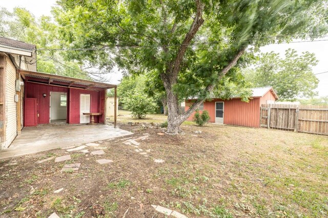 705 Dunning St, Gonzales, TX 78629 - view of yard with an outdoor structure
