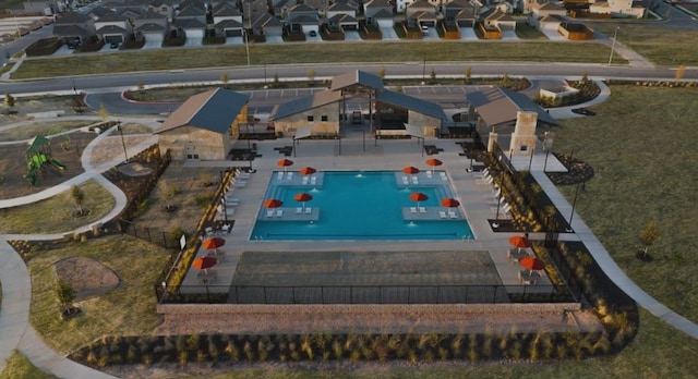 4003 Wynn Rd, Hutto, TX 78634 - view of property location with a pool area and nearby suburban area