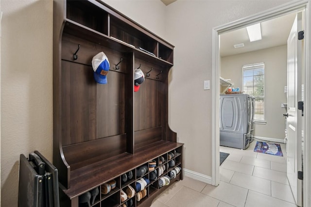 3713 Glastonbury Trl, Pflugerville, TX 78660 - mudroom with tile patterned floors and washer and dryer