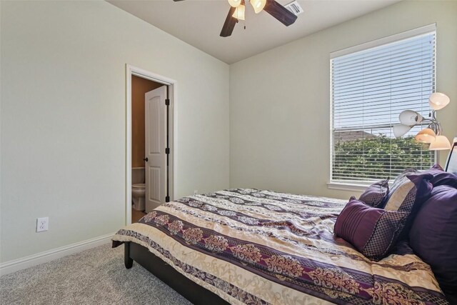 3713 Glastonbury Trl, Pflugerville, TX 78660 - carpeted bedroom featuring a ceiling fan and ensuite bathroom
