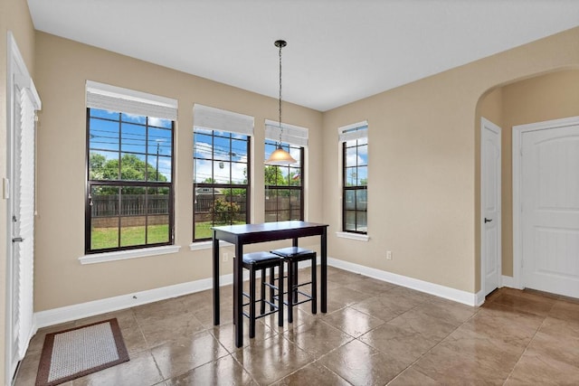 301 Wye Oak St, Austin, TX 78748 - dining area featuring arched walkways and baseboards