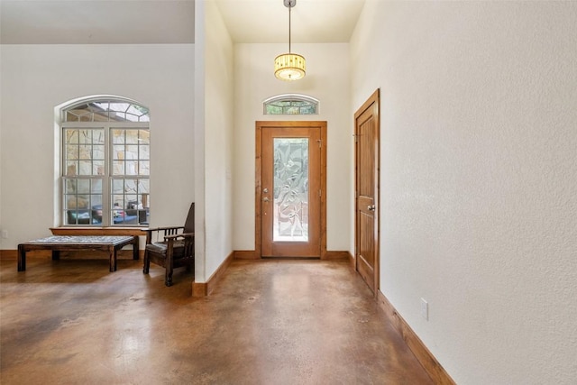 267 Corral Rd, Smithville, TX 78957 - foyer entrance with finished concrete floors and a towering ceiling