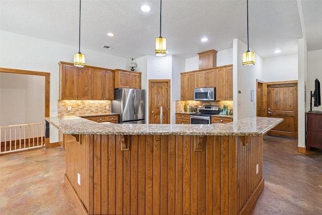 267 Corral Rd, Smithville, TX 78957 - kitchen with stainless steel appliances, finished concrete floors, decorative backsplash, a breakfast bar area, and recessed lighting
