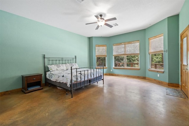 267 Corral Rd, Smithville, TX 78957 - bedroom featuring concrete floors and ceiling fan