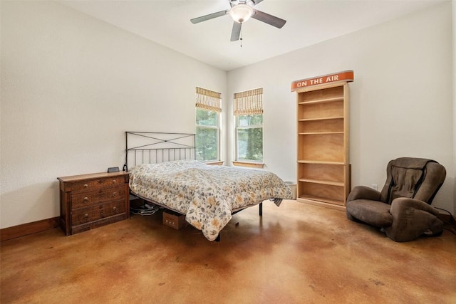 267 Corral Rd, Smithville, TX 78957 - carpeted bedroom with baseboards and a ceiling fan