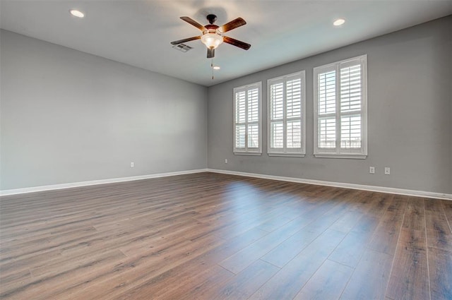 2836 Garnet Ridge Dr, Leander, TX 78641 - empty room with ceiling fan, dark wood finished floors, and recessed lighting