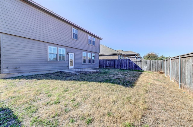 2836 Garnet Ridge Dr, Leander, TX 78641 - back of house with a fenced backyard