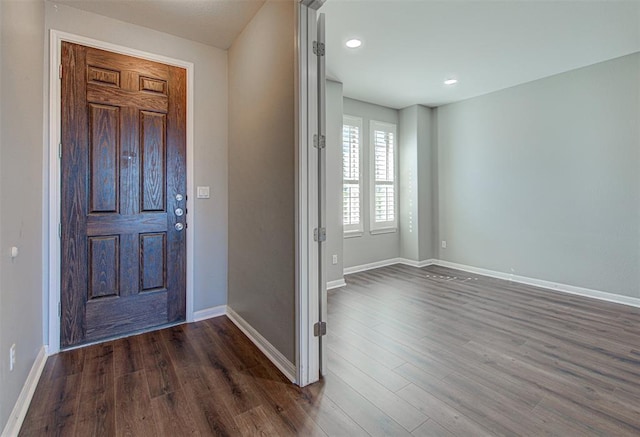 2836 Garnet Ridge Dr, Leander, TX 78641 - foyer entrance with dark wood-type flooring and recessed lighting