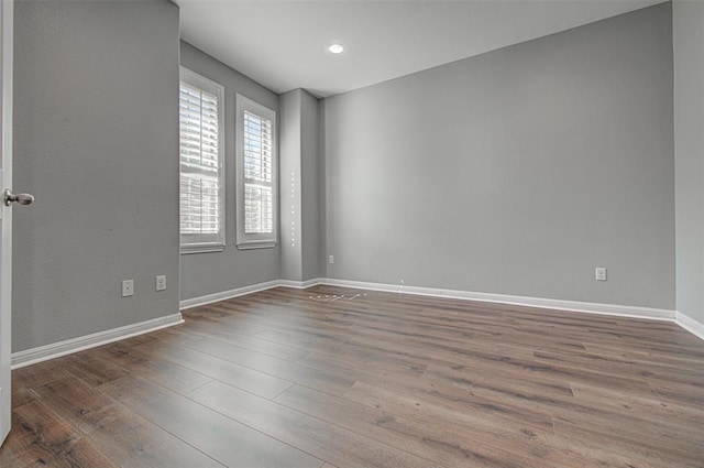 2836 Garnet Ridge Dr, Leander, TX 78641 - unfurnished room with wood finished floors and recessed lighting