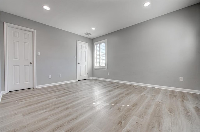 2836 Garnet Ridge Dr, Leander, TX 78641 - spare room with light wood finished floors and recessed lighting