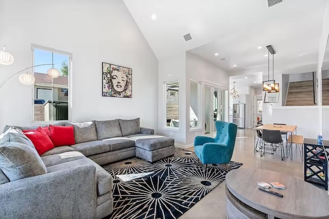 4314 Jinx Ave Unit A, Austin, TX 78745 - living area featuring high vaulted ceiling, a chandelier, and recessed lighting