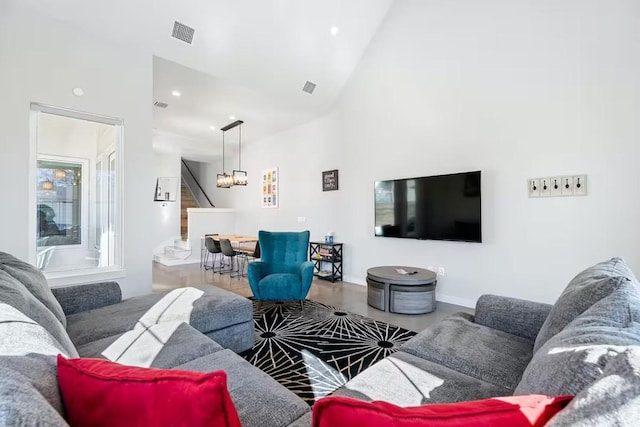 4314 Jinx Ave Unit A, Austin, TX 78745 - living room featuring stairway, high vaulted ceiling, and recessed lighting