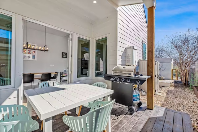 4314 Jinx Ave Unit A, Austin, TX 78745 - wooden terrace with grilling area, a shed, and outdoor dining area