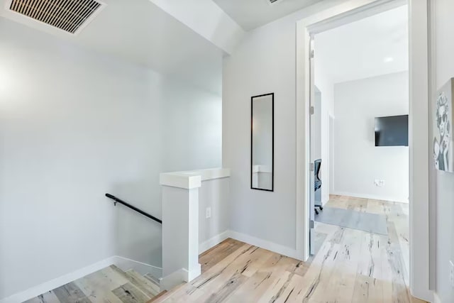 4314 Jinx Ave Unit A, Austin, TX 78745 - hallway featuring an upstairs landing and light wood finished floors