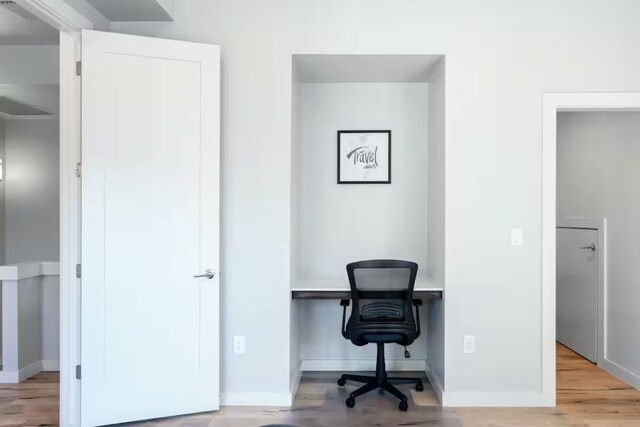 4314 Jinx Ave Unit A, Austin, TX 78745 - office area featuring light wood-style flooring and baseboards